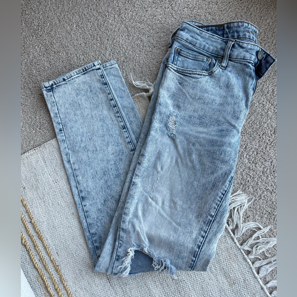 Distressed white washed jeans